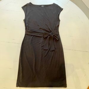 Cap sleeve black faux wrap dress. Black by Saks Fifth Avenue. Size 6